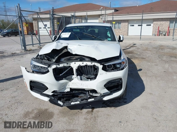2021 BMW X4 xDrive30i with VIN 5UX2V1C03M9F12611, listed as a IAAI auction lot 42145740 with 60,417 mi miles and . Bid and sale history available at DreamBid. Image 12.