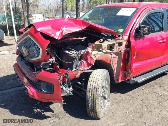 2019 Toyota Tacoma 4WD SR with VIN 3TMCZ5ANXKM279726, listed as a IAAI auction lot 41811749 with 56,017 mi miles. Bid and sale history available at carsss.com. Image 6.