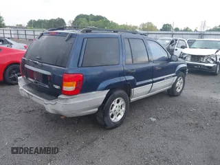 2000 Jeep Grand Cherokee Laredo with VIN 1J4G248S4YC144404, listed as a IAAI auction lot 42114635 with 181,854 mi miles and . Bid and sale history available at DreamBid. Image 4.