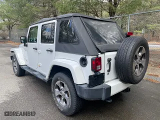 2016 Jeep Wrangler Unlimited 75th Anniversary with VIN 1C4BJWEG5GL215915, listed as a Copart auction lot 52680895 with 143,836 mi miles and Clean Title. Bid and sale history available at carsss.com. Image 3.