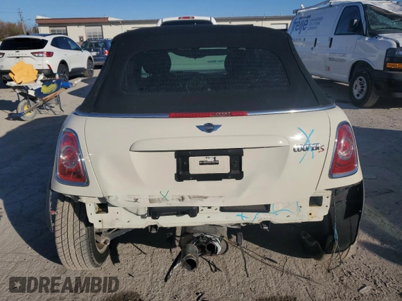 2015 MINI Convertible S with VIN WMWZP3C52FT708377, listed as a Copart auction lot 79817344 with 54,466 mi miles and Salvage title. Bid and sale history available at DreamBid. Image 10.
