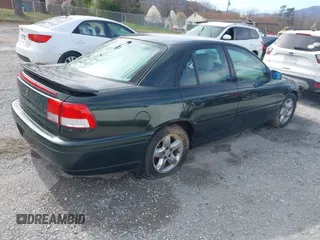 2000 Cadillac Catera z VIN W06VR54R0YR002664, wystawiony jako IAAI lot #41857553 z przebiegiem 86 354 mil mil oraz . Historia ofert i sprzedaży dostępna na DreamBid. Obrazek 4.