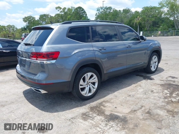 2021 Volkswagen Atlas SE with VIN 1V2HR2CA9MC585740, listed as a IAAI auction lot 42279757 with 64,995 mi miles and . Bid and sale history available at DreamBid. Image 4.