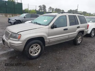 2004 Jeep Grand Cherokee Laredo with VIN 1J4GW48N24C230058, listed as a IAAI auction lot 42386914 with Not provided miles and . Bid and sale history available at DreamBid. Image 2.
