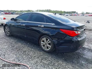 2013 Hyundai Sonata SE with VIN 5NPEC4AC6DH685157, listed as a IAAI auction lot 41936413 with 219,163 mi miles. Bid and sale history available at carsss.com. Image 3.