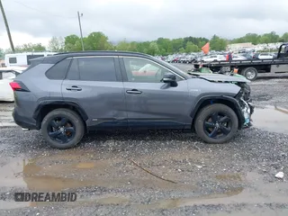 2021 Toyota RAV4 Hybrid XSE with VIN JTME6RFV0MD515817, listed as a IAAI auction lot 42127698 with 98,078 mi miles and . Bid and sale history available at DreamBid. Image 14.
