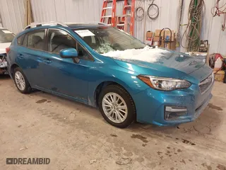2017 Subaru Impreza Premium with VIN 4S3GTAD68H3727584, listed as a IAAI auction lot 41453925 with 55,461 mi miles. Bid and sale history available at carsss.com. Image 1.