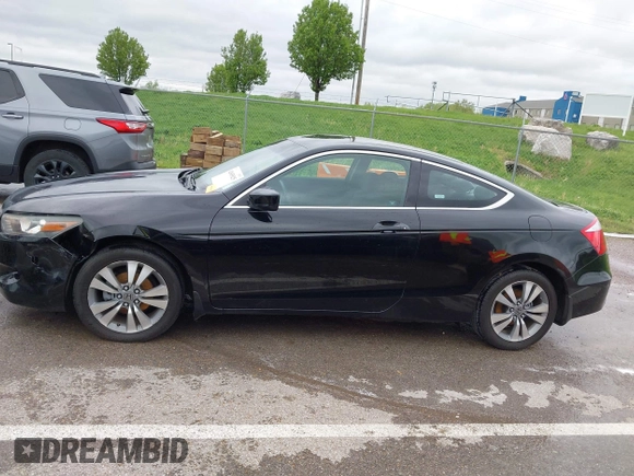 2009 Honda Accord LX-S with VIN 1HGCS12339A010440, listed as a IAAI auction lot 42045025 with 126,767 mi miles and . Bid and sale history available at DreamBid. Image 14.
