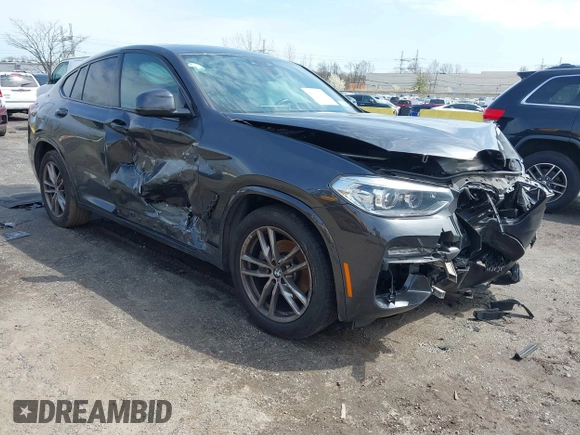 2021 BMW X4 xDrive30i z VIN 5UX2V1C02M9G88260, wystawiony jako IAAI lot #41991270 z przebiegiem 48 817 mil mil oraz . Historia ofert i sprzedaży dostępna na DreamBid. Obrazek 1.