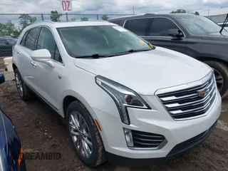 2019 Cadillac XT5 Luxury FWD z VIN 1GYKNCRS5KZ102659, wystawiony jako IAAI lot #42309995 z przebiegiem 67 795 mil mil oraz . Historia ofert i sprzedaży dostępna na DreamBid. Obrazek 1.