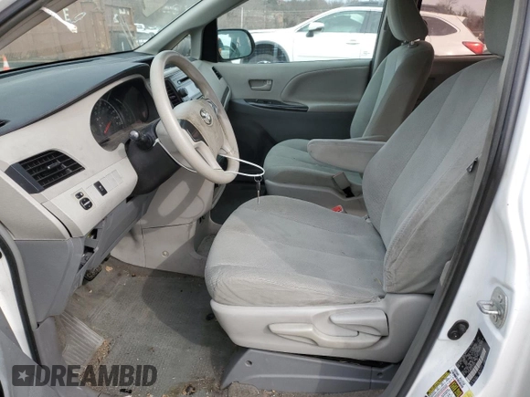 2014 Toyota Sienna L with VIN 5TDZK3DC6ES430935, listed as a Copart auction lot 45877115 with 395,117 mi miles and Salvage Title. Bid and sale history available at carsss.com. Image 7.