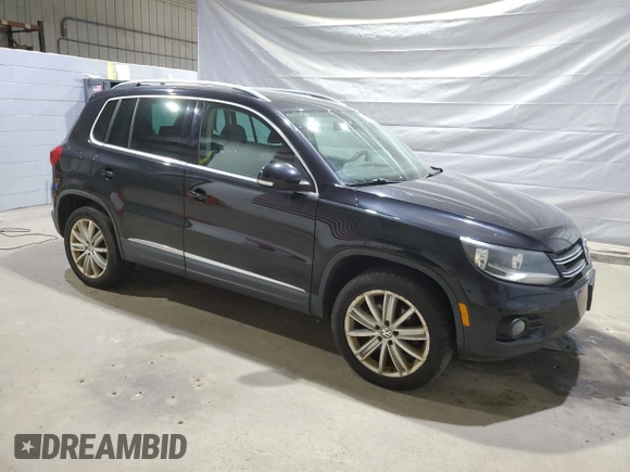 2012 Volkswagen Tiguan SE with VIN WVGBV7AX2CW525234, listed as a Copart auction lot 61307915 with 123,938 mi miles and Clean title. Bid and sale history available at DreamBid. Image 4.