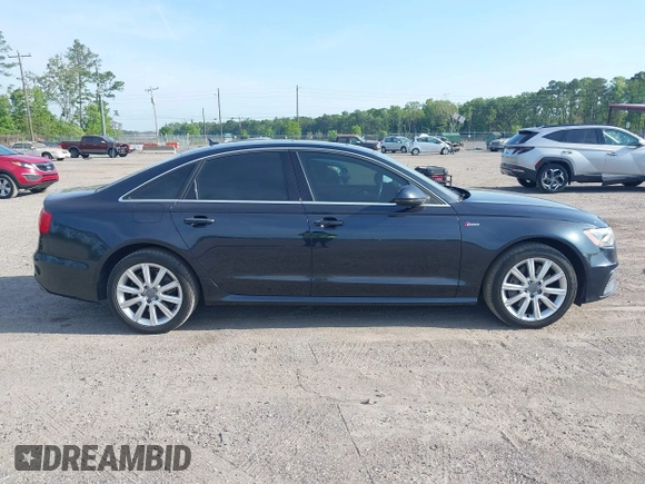 2015 Audi A6 3.0T Prestige with VIN WAUHGAFC3FN011654, listed as a IAAI auction lot 42104153 with 166,719 mi miles. Bid and sale history available at carsss.com. Image 13.