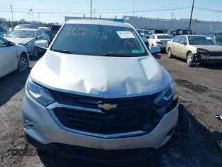 2019 Chevrolet Equinox LT with VIN 3GNAXUEV5KS670478, listed as a IAAI auction lot 41745218 with 56,996 mi miles and . Bid and sale history available at DreamBid. Image 12.