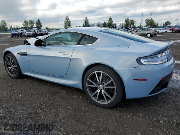 2015 Aston Martin Vantage z VIN SCFEKBAK2FGC19462, wystawiony jako Copart lot #61093934 z przebiegiem 53 068 mil mil oraz Szkoda całkowita • Salvage title. Historia ofert i sprzedaży dostępna na DreamBid. Obrazek 2.