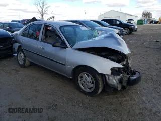 1998 Ford Escort LX z VIN 1FAFP10P9WW308918, wystawiony jako Copart lot #47925665 z przebiegiem Nie podano mil oraz Szkoda całkowita • Salvage title. Historia ofert i sprzedaży dostępna na DreamBid. Obrazek 4.