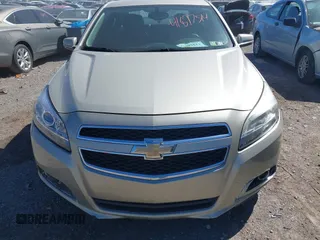 2013 Chevrolet Malibu LT with VIN 1G11C5SA4DF184305, listed as a IAAI auction lot 41897514 with 188,277 mi miles and . Bid and sale history available at DreamBid. Image 12.