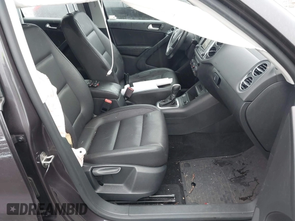 2016 Volkswagen Tiguan R-Line with VIN WVGBV7AX8GW592927, listed as a IAAI auction lot 41521533 with 79,563 mi miles and . Bid and sale history available at DreamBid. Image 5.