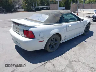 2004 Ford Mustang Deluxe z VIN 1FAFP44684F179912, wystawiony jako IAAI lot #42359560 z przebiegiem 268 207 mil mil oraz . Historia ofert i sprzedaży dostępna na DreamBid. Obrazek 4.