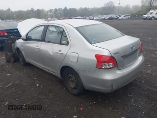 2009 Toyota Yaris with VIN JTDBT903494047486, listed as a IAAI auction lot 42173242 with 145,225 mi miles. Bid and sale history available at carsss.com. Image 3.