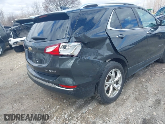 2018 Chevrolet Equinox Premier with VIN 2GNAXVEVXJ6188205, listed as a IAAI auction lot 42028868 with 93,828 mi miles and . Bid and sale history available at DreamBid. Image 6.