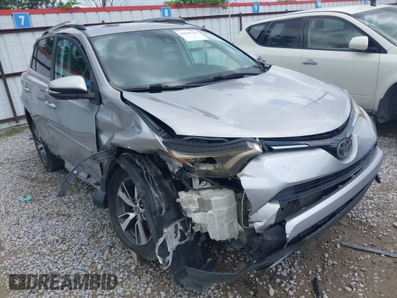 2017 Toyota RAV4 XLE with VIN 2T3WFREV5HW331648, listed as a IAAI auction lot 42137115 with 141,977 mi miles and . Bid and sale history available at DreamBid. Image 1.