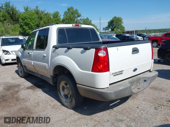 2005 Ford Explorer Sport Trac XLS z VIN 1FMZU67K25UB92409, wystawiony jako IAAI lot #42799036 z przebiegiem 150 554 mil mil oraz . Historia ofert i sprzedaży dostępna na DreamBid. Obrazek 3.