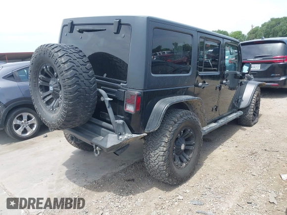 2012 Jeep Wrangler Unlimited Sport with VIN 1C4BJWDG3CL200826, listed as a IAAI auction lot 42261113 with 135,554 mi miles and . Bid and sale history available at DreamBid. Image 4.
