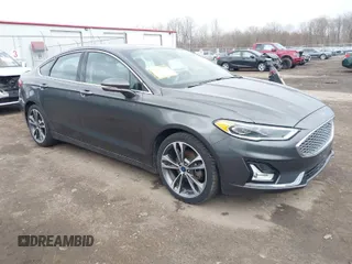 2019 Ford Fusion Titanium with VIN 3FA6P0K9XKR259556, listed as a IAAI auction lot 41823997 with 132,071 mi miles. Bid and sale history available at carsss.com. Image 1.