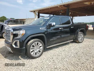 2020 GMC Sierra 1500 Denali with VIN 1GTU9FEL1LZ160062, listed as a Copart auction lot 59551395 with 106,223 mi miles and Salvage title. Bid and sale history available at DreamBid. Image 1.