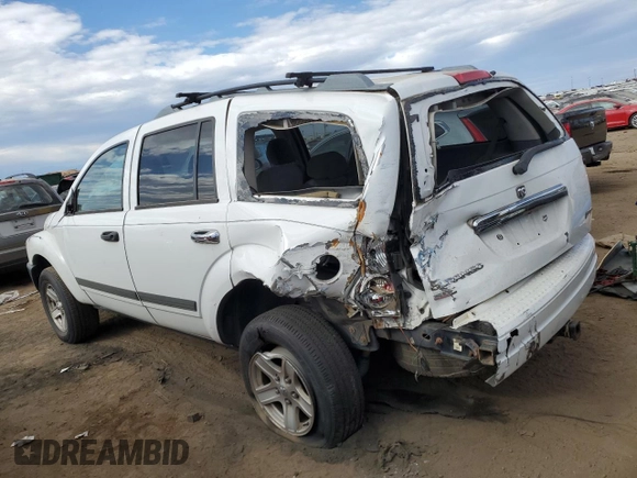 2006 Dodge Durango SLT with VIN 1D4HD48286F104619, listed as a Copart auction lot 77433824 with 221,631 mi miles and Salvage title. Bid and sale history available at DreamBid. Image 2.