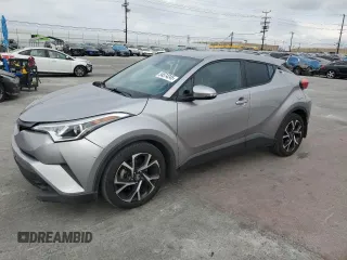 2018 Toyota C-HR XLE z VIN NMTKHMBX3JR023403, wystawiony jako Copart lot #54574245 z przebiegiem 119 657 mil mil oraz Szkoda całkowita • Salvage title. Historia ofert i sprzedaży dostępna na DreamBid. Obrazek 1.