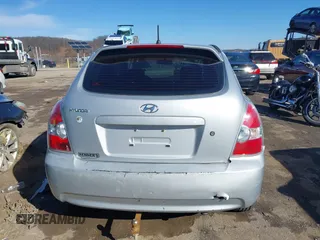 2007 Hyundai Accent GS with VIN KMHCM36C97U043769, listed as a IAAI auction lot 41526011 with 230,566 mi miles. Bid and sale history available at carsss.com. Image 6.