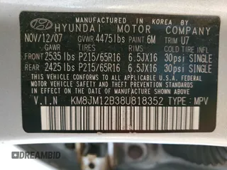 2008 Hyundai Tucson GLS with VIN KM8JM12B38U818352, listed as a Copart auction lot 71503394 with 186,965 mi miles and Salvage Title. Bid and sale history available at carsss.com. Image 14.