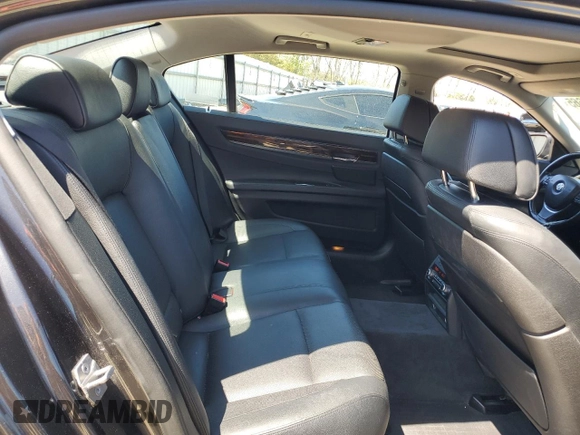 2013 BMW 7 Series 740Li xDrive с VIN WBAYF4C55DDE23798, выставлен на аукционе Copart как лот 52967665 с пробегом 191 023 миль миль и Списание • Salvage title. История ставок и продаж доступна на DreamBid. Изображение 10.