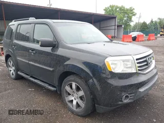 2012 Honda Pilot Touring z VIN 5FNYF4H92CB074778, wystawiony jako IAAI lot #42267913 z przebiegiem 138 362 mil mil oraz . Historia ofert i sprzedaży dostępna na DreamBid. Obrazek 1.