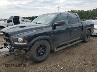 2017 Ram 1500 Rebel with VIN 1C6RR7YT9HS738374, listed as a Copart auction lot 57598045 with 143,537 mi miles and Salvage title. Bid and sale history available at DreamBid. Image 1.