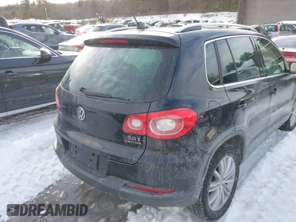 2011 Volkswagen Tiguan SE with VIN WVGBV7AX7BW515555, listed as a IAAI auction lot 41627913 with 49,424 mi miles and . Bid and sale history available at DreamBid. Image 4.