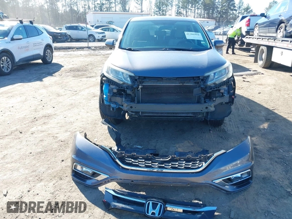 2016 Honda CR-V EX with VIN 5J6RM4H58GL095297, listed as a IAAI auction lot 41386994 with 154,595 mi miles and . Bid and sale history available at DreamBid. Image 6.