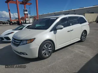 2017 Honda Odyssey Touring с VIN 5FNRL5H99HB002616, выставлен на аукционе Copart как лот 80447654 с пробегом Не указан миль и Списание • Salvage title. История ставок и продаж доступна на DreamBid. Изображение 1.