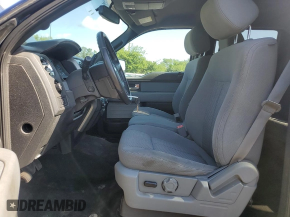 2014 Ford F-150 XL with VIN 1FTFW1ET2EFC54587, listed as a Copart auction lot 64996265 with 96,712 mi miles and Salvage title. Bid and sale history available at DreamBid. Image 7.