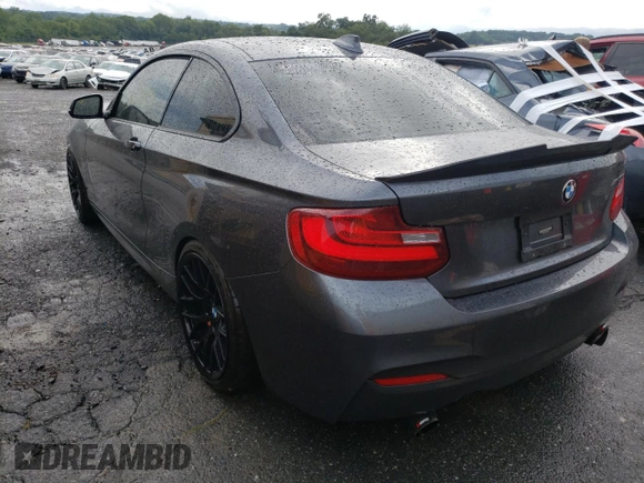 2015 BMW 2 Series M235i with VIN WBA1J7C59FV358921, listed as a Copart auction lot 57683632 with 67,884 mi miles. Bid and sale history available at carsss.com. Image 3.