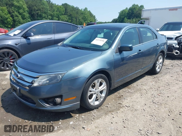 2012 Ford Fusion SE z VIN 3FAHP0HA4CR209490, wystawiony jako IAAI lot #42376506 z przebiegiem 145 622 mil mil oraz . Historia ofert i sprzedaży dostępna na DreamBid. Obrazek 18.