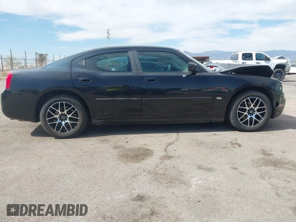 2010 Dodge Charger SXT with VIN 2B3CA3CV4AH153286, listed as a IAAI auction lot 42110970 with 162,424 mi miles and . Bid and sale history available at DreamBid. Image 13.