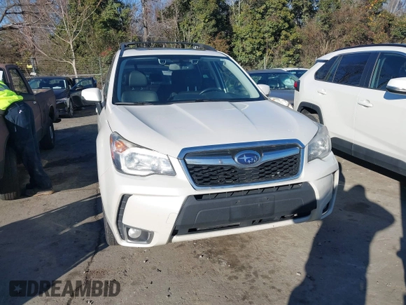 2014 Subaru Forester XT Touring with VIN JF2SJGPC9EH417920, listed as a IAAI auction lot 41270689 with 184,976 mi miles and . Bid and sale history available at DreamBid. Image 12.