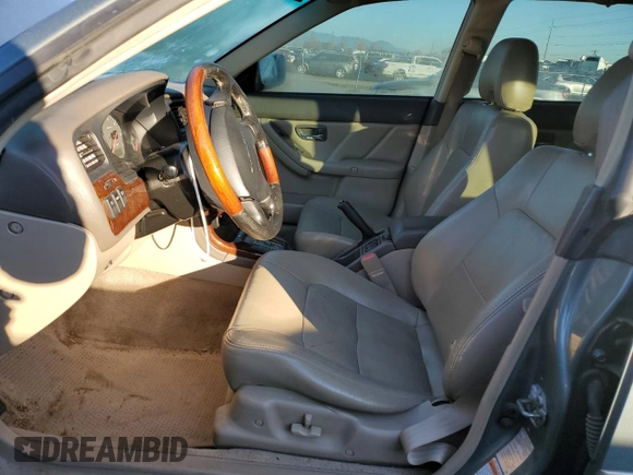 2001 Subaru Legacy Outback VDC with VIN 4S3BH896517651821, listed as a Copart auction lot 79705664 with 203,619 mi miles and Salvage title. Bid and sale history available at DreamBid. Image 7.