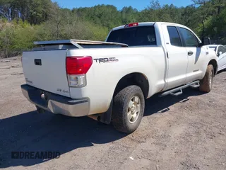 2010 Toyota Tundra z VIN 5TFUW5F15AX148425, wystawiony jako IAAI lot #41829616 z przebiegiem 125 623 mil mil oraz . Historia ofert i sprzedaży dostępna na DreamBid. Obrazek 4.
