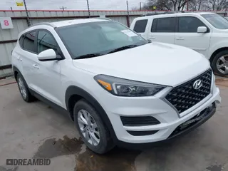 2019 Hyundai Tucson Value with VIN KM8J3CA42KU874050, listed as a IAAI auction lot 41516201 with 146,795 mi miles. Bid and sale history available at carsss.com. Image 1.