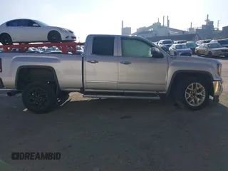 2017 GMC Sierra 1500 SLT z VIN 1GTV2NEC6HZ102412, wystawiony jako IAAI lot #41170633 z przebiegiem 163 321 mil mil oraz . Historia ofert i sprzedaży dostępna na DreamBid. Obrazek 13.