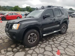 2015 Nissan Xterra Pro-4X with VIN 5N1AN0NW2FN658140, listed as a Copart auction lot 61142255 with 151,086 mi miles and Clean title. Bid and sale history available at DreamBid. Image 1.